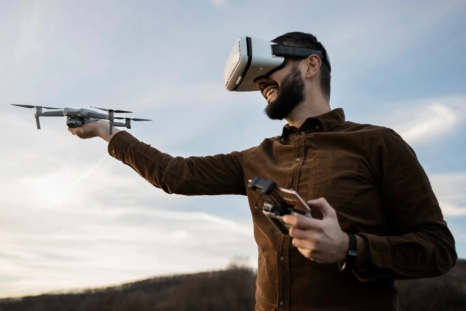 Drone piloting training at Smart Drone Academy Certified drone instructor holding a drone at Smart Drone Academy